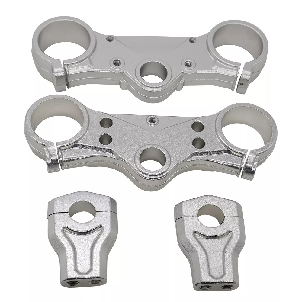 El-cykel smedet Triple Clamp